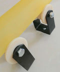 Heavy Duty Nylon H Type Pulley With Double Steel Bearings And Square Groove Track Wheel for Synchronous Belt Drives mounted on a black bracket.