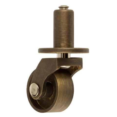 Dead Nuts Reliable Antique Brass Furniture Casters With Slick Gliding Wheels For Dressers Couches And Tables close-up view of caster wheel.