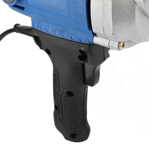 Close-up of the Heavy Duty Corded Mixing Drill With Six Speed Settings Up To Three Thousand Rpm, showing the durable grip and motor housing.