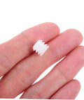 Two Hundred Piece Cabinet Fitting Kit With Rock Solid Self Tapping Screws And Heavy Duty Metal Connectors, white nylon screw plug in hand.