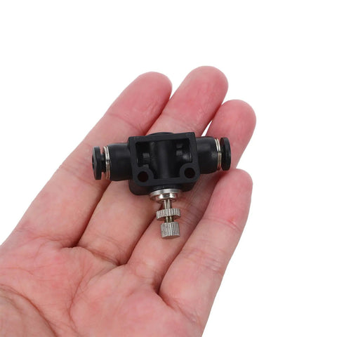 Three Pack Pneumatic Flow Control Valves With Push To Connect Tube Fittings High Pressure Tolerance And Precise Flow Adjustment For Air Cylinders And PU Tubing In Industrial Automation Kit black valve with knurled screw in hand