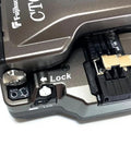 Pro Grade Optical Fiber Cleaver Featuring Motorized Blade And Automatic Rotation Bluetooth Sync showing top view with lock and link buttons.