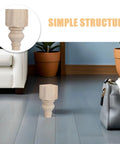 Two Pack Round 5.9 Inch Solid Wood Sofa Legs With Unfinished Surface And Carved Design shown against white sofa.