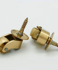 Premium Polished Brass Swivel Casters With 22 mm Wheels And 360 Degree Rotation showing two brass casters with screws.