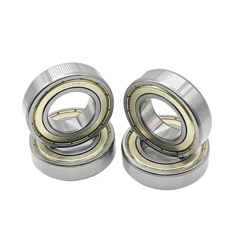 Heavy Duty Deep Groove Chrome Steel Ball Bearing With Double Sealed Housing Runs Slick For Long Haul Performance And Wear Resistant Industrial Precision On Demanding Duties, four ball bearings stacked.