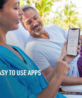 Couple using smartphone app to control Renewed T5 Plus Smart Thermostat Black With 7 Day Scheduling And Location Based Temperature Control.