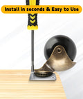 Smooth Operator 2 Inch Heavy Duty Double Ball Bearing Caster Wheels with brass accents and screwdriver for installation on wood.
