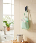 Heavy Duty Black Zinc Alloy Wall Towel Hooks For Bathroom holding a mint green organizer with papers in a modern bathroom setting.