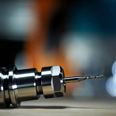 Close-up of a Five Piece 1/8 Inch Compression Router Bit Set With 1/4 Inch Shank Up Down Spiral Carbide Bits for woodworking use.