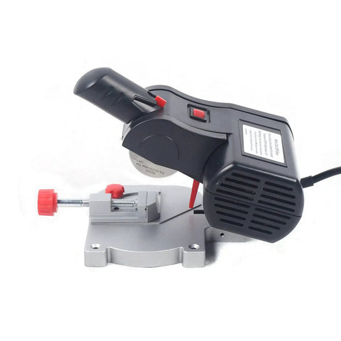 Top Shelf Mini Bench Cut Off Saw With Buttery Smooth Blade Swap And Rock Solid Countertop Clamps For Precision Angled Cuts On Wood Metal Plastic And Glass, showing detailed black cutter with red clamps.