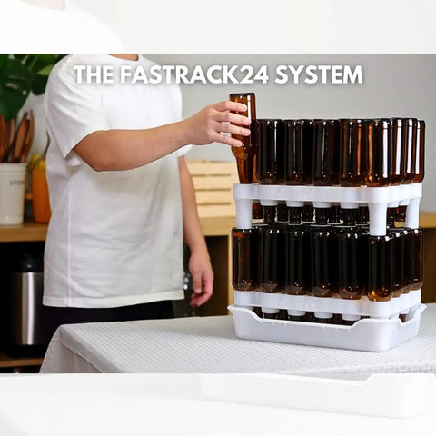 Top Shelf Bottle Drying Rack And Tray Bundle For Homebrewers Holds Sixty Vessels Stackable Dishwasher Safe Stand showcasing amber bottles on stacked racks.