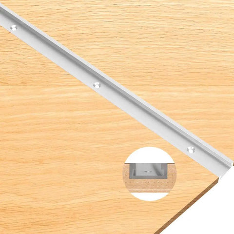 Tough As Nails Aluminum T Track With Double Cut Profile And Predrilled Mounting Holes For Woodworking Jigs and Fixtures, shown on wood surface.