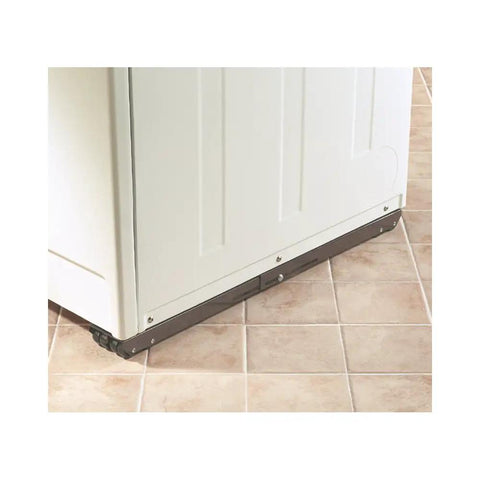 Solid Heavy Duty Appliance Rollers With Expandable Design To Crush Massive Moving Loads, installed under a white appliance on tile.