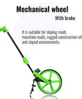 Rock Solid Aluminum Measuring Wheel With Giant Digital Dial And Easy Fold Handle For No Sweat Field Work And Swift Land Surveying Up to 9999 Meters, showing green wheel with brake.