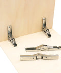 Rock Solid Nickel Plated Hidden Hinges For Cabinet Doors And Shelves Built Tough As Nails With Smooth Swing Operation Easy No Drill Install Heavy Duty Furniture Hardware 10 Pack mounted on a wooden surface.