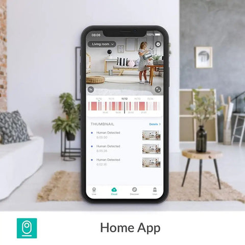Top Tier 1080p AI Indoor Security Camera Featuring Sharp Human And Pet Motion Tracking Pan And Tilt Sweep For Effortless Home Crib Surveillance displayed on smartphone in living room.