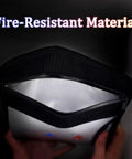 Open heavy duty fireproof document pouch with silicone coated exterior showing aluminum foil lining, dark backdrop.