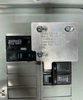 Close-up of Generator Interlock Kit With Electric Start For 100 Amp Panels Compatible With Siemens Eaton Or ITE Billet Aluminum Made In USA Includes Installation Instructions Mounting Hardware Drill Bit And Panel Stickers installed on panel