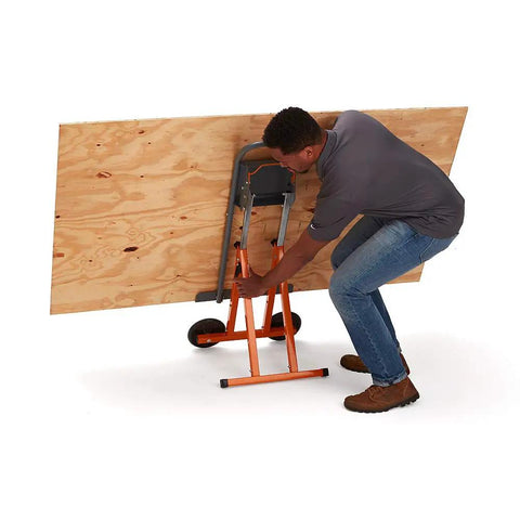 Person using Next Gen Panel Carrier and Panel Dolly to move 4x8 sheet, adjustable height 28-38 inches, 350 lb capacity, strong 1 5/8 inch lip.