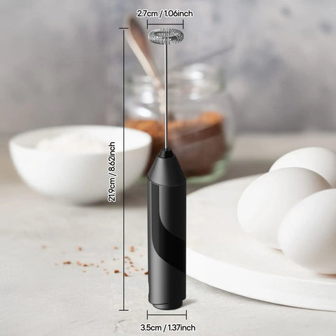 Black Handheld Milk Frother Cordless Electric Foam Maker with stainless steel whisk, dimensions shown, set on a kitchen counter.