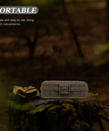 Tough As Nails Heavy Duty Plastic Toolbox With Interlocking Stackable Design And Thick Three Layer Foam Cushioning For Job Site Ready Water Resistant Gear Storage And Drop Safe Protection on a stump outdoors.