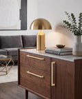 2 Pack Of 6 Inch Matte Gold Cabinet Pulls With Brushed Satin Finish For Kitchen Cabinets And Bathroom Drawers Featuring A Solid Zinc Alloy Build showcased on a modern sideboard.