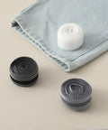 Iron On Hem Tape 5m Roll For Jeans And Heavy Fabric No Sweat Fix Quick Pants Mending Adhesive Strip Tailor Free Clothing Repair Tape in three colors on fabric.