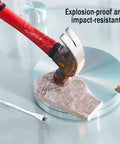 Premium Tempered Glass Lazy Susan Turntable Serving Tray For Dining Tables And Party Crews Featuring Silky Swivel Spin and No Sweat Washup At Thirty Four Inches Across, shown with a hammer hitting a stone.