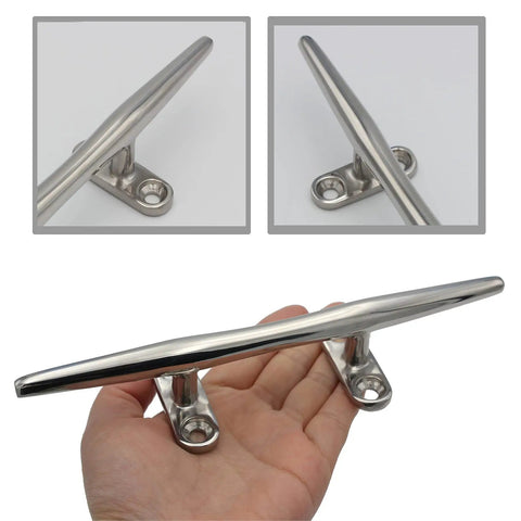 Hand holding 8 Inch 316 Stainless Steel Boat Cleats Open Base With Hardware Set Of 4 For Dock Marine Use And Nautical Decor.