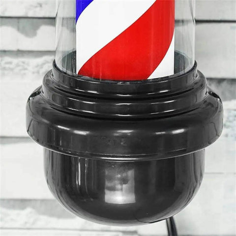 Close-up of the stainless steel base of the Shop Grade Rotating Barber Pole Light Hella Weatherproof Hair Salon Wall Sign.