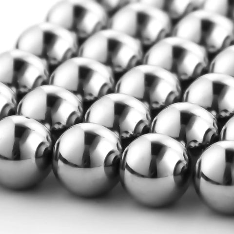 Professional Grade 25 Pack 1/4 Inch Chrome Steel G25 Precision Ball Bearings showing shiny chrome ball bearings.