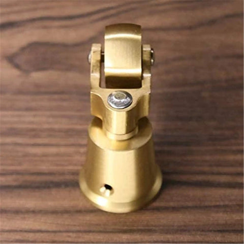 Built Tough Heavy Duty Antique Casters Featuring Sweet Smooth Gliding Solid Brass Wheels And Rock Solid Double Bearings For Easy Furniture Rolling And Zero Floor Scratches, close-up view of brass caster.