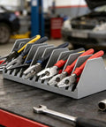 Two Pack 10 Slot Pliers Organizer Rack Set For Tools Drawer With Non Slip Rubber Base holding various pliers in a workshop setting