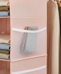 Upgrade Closet Game With This Heavy Duty Double Sided Hanging Wardrobe Organizer Packing Deep Side Pockets For Shoes And Gear To Instantly Boost Vertical Storage Capacity While Keeping Bedrooms Clean And Stress Free All Year. Image of deep side pockets holding a gray sock.