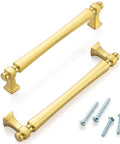 Top Shelf 5 Inch Brushed Gold Cabinet Pulls 10 Pack Sleek French Style Drawer Hardware For Kitchen And Bathroom Kickass Solid Metal Build Rust Resistant Finish With Zero Hassle Installation Kit Included showing handles with screws.