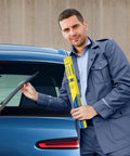 Genuine 3 Pack Windshield Wiper Blades Built Tough For Nissan Rogue And Pathfinder Cruisers Who Want Hella Reliable All Weather Coverage With Silent Natural Rubber Action That Guarantees A Pristine View Every Time, shown by a man holding wiper blades.