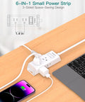 Slim Flat Plug Extension Cord With Six Outlets And Right Angle Design Gonna Save You Serious Space Behind Sofas Beds Or Fridges Perfect For Dorms Tiny Spots keeps devices charged with compact design on a desk.