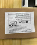 Premium Two Core One Point Five Millimeter Coiled Spring Cable With Bare Copper Conductors packaging box and safety label.