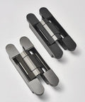 Three Pack Heavy Duty Concealed Door Hinges Offering Smooth Hydraulic Cushioning And Built Tough Brass Craftsmanship For Zero Drama Setup And Bulletproof 180 Degree Swing Plus Reliable 100 Kilogram Load Holding In Cool Grey.