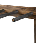 Close-up of the Rustic Burnt Wood Freestanding Surfboard Rack, black padded arms, vertical stand, indoor storage for four boards.