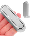 No Sweat Foldable Invisible Wall Hooks Zinc Alloy Storage Hangers 4 Pack in hand, compact size for small spaces.
