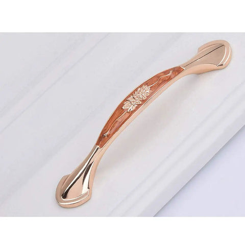 Heavy Duty Zinc Alloy Cabinet Pulls And Drawer Knobs Knockout Amber Gold Finish straight cabinet pull on white surface.