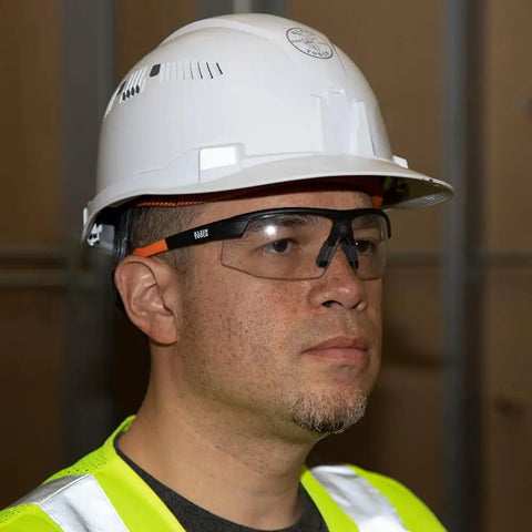 Top Tier Semi Frame Safety Glasses With Clear Lens Pack Serious Eye Protection And Scratch Resistant Coating worn by a man in a hard hat.