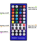 Remote control for RGBWW Under Cabinet Puck Light Kit with Daisy Chain Link, Remote Dimmer, Multi Color Warm White Ambiance options.