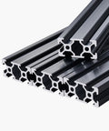 Badass 2040 T-Slot Aluminum Extrusion Profile With Sleek Anodized Finish, showing 1000mm rails stacked for CNC rigs and 3D printers.