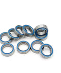 Top Shelf Blue Miniature Ball Bearings 6700 2RS Rubber Sealed RC Car Parts 10X15X4 MM Abec 7 Precision visible in a pile.