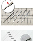Top Shelf Tungsten Steel Scriber Blades In Five Precision Sizes With Secure Rubber Guard shown on grid, highlighting sizes 0.2mm to 1.0mm.