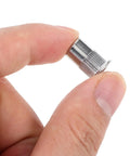 Close-up of a knurled threaded insert from Stainless Steel Rivet Nuts Kit With 120 Pieces Flat Head Knurled Threaded Inserts For Quick, Secure Connections