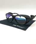Heavy Duty Laser Safety Glasses For YAG Fiber Laser Engraver on a cloth, showing reflective lenses and black nylon frames.