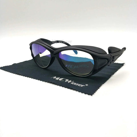 Heavy Duty Laser Safety Glasses For YAG Fiber Laser Engraver on a cloth, showing reflective lenses and black nylon frames.